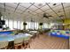Bright and spacious community room with tables and chairs at 1605 S Ocean Blvd. # 1807, Myrtle Beach, SC 29577