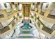 Building lobby with central fountain at 1605 S Ocean Blvd. # 1807, Myrtle Beach, SC 29577