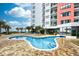 Outdoor kidney-shaped pool with brick patio and lounge chairs at 1605 S Ocean Blvd. # 1807, Myrtle Beach, SC 29577
