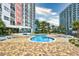 Resort-style pool with plenty of lounge chairs for relaxation at 1605 S Ocean Blvd. # 1807, Myrtle Beach, SC 29577
