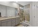 Bathroom boasts a double vanity, granite counters, and a walk in shower at 2327 Lark Sparrow St., Myrtle Beach, SC 29577
