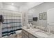 Stylish bathroom featuring a shower/tub combo and granite vanity at 2327 Lark Sparrow St., Myrtle Beach, SC 29577