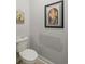 Small bathroom with toilet and repainting needed at 2327 Lark Sparrow St., Myrtle Beach, SC 29577