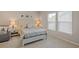 Serene bedroom with a double bed, nightstands and large windows at 2327 Lark Sparrow St., Myrtle Beach, SC 29577