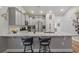 Island kitchen features granite countertops and breakfast bar seating at 2327 Lark Sparrow St., Myrtle Beach, SC 29577