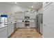 Modern kitchen with stainless steel appliances and ample cabinet space at 2327 Lark Sparrow St., Myrtle Beach, SC 29577