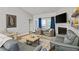 Relaxing living room with plush seating and a fireplace at 2327 Lark Sparrow St., Myrtle Beach, SC 29577