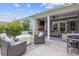 Relaxing covered patio with fireplace, seating, and grill at 2327 Lark Sparrow St., Myrtle Beach, SC 29577