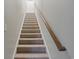 Carpeted staircase leading to the upper level of the home at 2327 Lark Sparrow St., Myrtle Beach, SC 29577