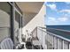 Balcony with ocean view and seating for two at 2701 S Ocean Blvd. # 1808, North Myrtle Beach, SC 29582