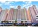 Baywatch Resort: Exterior view of the building with parking at 2701 S Ocean Blvd. # 1808, North Myrtle Beach, SC 29582