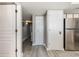 Light gray walls and wood-look floors in condo hallway at 2701 S Ocean Blvd. # 1808, North Myrtle Beach, SC 29582
