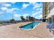 Relaxing rectangular pool with plenty of lounge chairs at 2701 S Ocean Blvd. # 1808, North Myrtle Beach, SC 29582