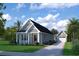 Charming craftsman style home with attached garage and landscaped lawn at 2709 Rowyn St., Longs, SC 29568