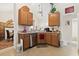 Kitchen with wooden cabinets, stainless steel appliances and a corner sink at 4165 Eva Bay Dr., Murrells Inlet, SC 29576