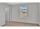 Simple bedroom with carpet and a large window at 1044 Kinness Dr., Conway, SC 29527