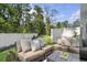 Private backyard with patio furniture and fenced-in grassy area at 178 Hoffman Park Dr. # 22, Myrtle Beach, SC 29588