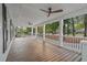 Spacious front porch with ceiling fans and wooden flooring at 204 Green Lake Dr., Myrtle Beach, SC 29572