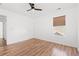 Light bedroom with wood floors and a door at 2053 Haystack Way, Myrtle Beach, SC 29579