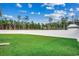 Large grassy backyard with white vinyl fence at 207 Palmetto Sand Loop, Conway, SC 29527