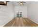 Bright bedroom with hardwood floors and sliding glass doors to a balcony at 223 Maison Dr. # B-11, Myrtle Beach, SC 29572