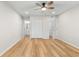 Bright bedroom with ceiling fan and wood-look floors at 223 Maison Dr. # B-11, Myrtle Beach, SC 29572