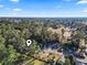 Aerial view of property highlighting its location in a residential neighborhood at 3055 Chestnut St., Loris, SC 29569
