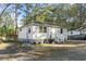 White house with a yard and some bicycles outside at 3055 Chestnut St., Loris, SC 29569