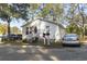 Front view of a small white house with car parked nearby at 3055 Chestnut St., Loris, SC 29569