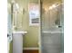 Small bathroom with shower, sink, and vanity at 310 46Th Ave. N, North Myrtle Beach, SC 29582