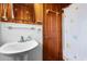 Clean bathroom with pedestal sink, shower, and nautical-themed curtain at 310 46Th Ave. N, North Myrtle Beach, SC 29582