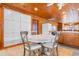 Open kitchen with white cabinets and a spacious dining area at 310 46Th Ave. N, North Myrtle Beach, SC 29582