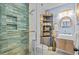 Modern bathroom with a glass shower, stylish tile, and built-in shelving at 351 Lake Arrowhead Rd. # 2-305, Myrtle Beach, SC 29572