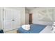 Bedroom with double doors to closet, and blue bedding, offering a serene atmosphere at 6040 Forest Dell Ct, Myrtle Beach, SC 29579