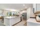 Spacious kitchen with white cabinets, quartz countertops, and stainless steel appliances at 6040 Forest Dell Ct, Myrtle Beach, SC 29579