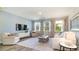 Light and airy living room with a neutral color palette and comfortable seating at 6040 Forest Dell Ct, Myrtle Beach, SC 29579