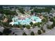 Aerial view of community pool, landscaping, and homes at 7035 Shooting Star Way, Myrtle Beach, SC 29579