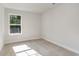 Bright bedroom with carpeted floor and a window offering natural light at 7035 Shooting Star Way, Myrtle Beach, SC 29579