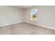 Bedroom with neutral carpet and a window offering views at 7035 Shooting Star Way, Myrtle Beach, SC 29579