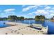 Wooden community dock with bench overlooking calm water at 7035 Shooting Star Way, Myrtle Beach, SC 29579
