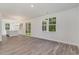Bright and airy living room with hardwood floors and lots of natural light at 7035 Shooting Star Way, Myrtle Beach, SC 29579