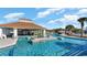 Resort-style pool with a large cabana and plenty of lounge space at 7035 Shooting Star Way, Myrtle Beach, SC 29579