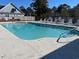 Sparkling community pool with lounge chairs for relaxation at 914 Mary Read Dr., North Myrtle Beach, SC 29582