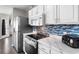 Modern kitchen with stainless steel appliances and white cabinetry at 101 Dry Gulley Ln., Surfside Beach, SC 29575