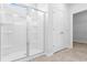 Clean bathroom with a large shower and built-in shelving at 1073 Nw Rosefield Way, Calabash, NC 28467