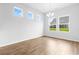 Dining room with hardwood floors and large windows at 1073 Nw Rosefield Way, Calabash, NC 28467