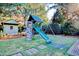 Large backyard with playset, shed, and spacious lawn at 116 Saint James St., Georgetown, SC 29440