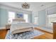 Light-blue bedroom with a bed and hardwood floors at 116 Saint James St., Georgetown, SC 29440