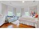 Bedroom with a bed, couch and hardwood floors at 116 Saint James St., Georgetown, SC 29440