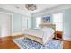 Light-blue bedroom with a bed and hardwood floors at 116 Saint James St., Georgetown, SC 29440